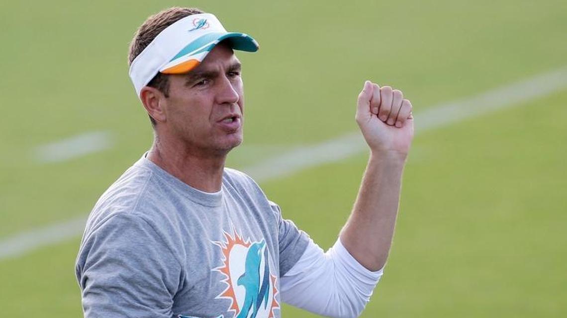 Miami Dolphins defensive backs coach Lou Anarumo talks to players at the team’s NFL football training camp, Aug. 5, 2015 in Davie, Fla.