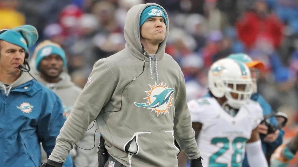 Miami Dolphins quarterback Ryan Tannehill (17) reacts after Miami Dolphins quarterback Matt Moore (8) is intercepted in the end zone in the second quarter as the Buffalo Bills host the Miami Dolphins at New Era Field in Orchard Park, NY on Sat., Dec. 24, 2016.