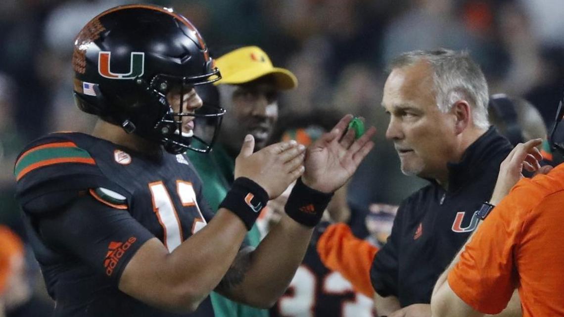 Miami Hurricanes quarterback Malik Rosier (12) talks with Miami Hurricanes head coach Mark Richt in the third quarter during the Dec. 30 Orange Bowl. Rosier has been praised for his performance in spring practice.