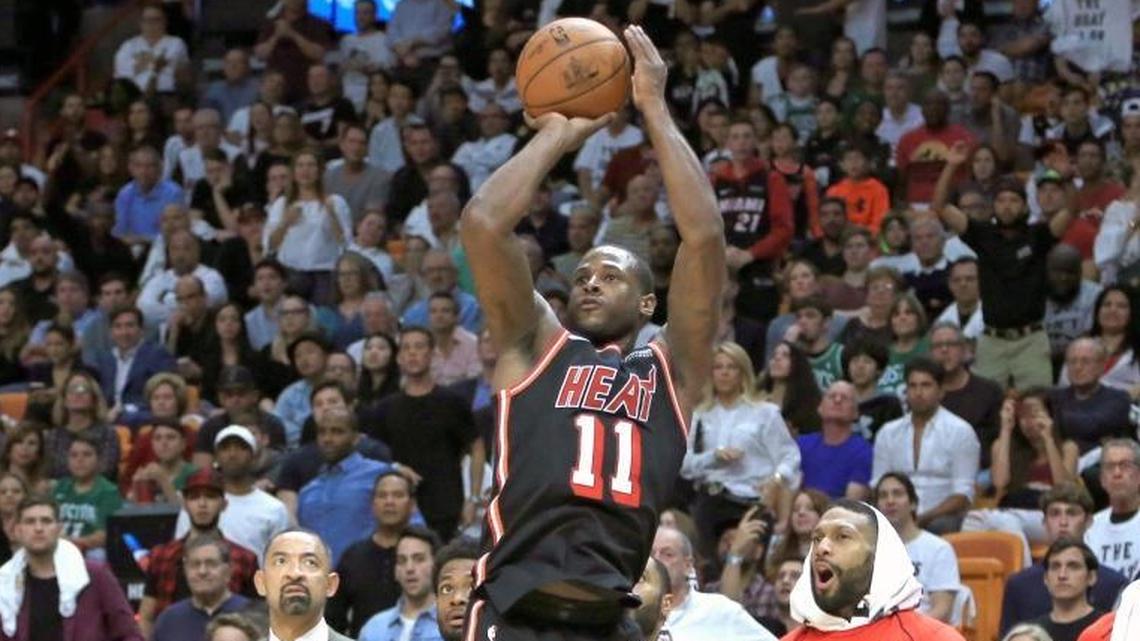Miami Heat guard Dion Waiters (11) hits a three pointer in the fourth quarter against Boston. Waiters has been inconsistent after getting a big contract.