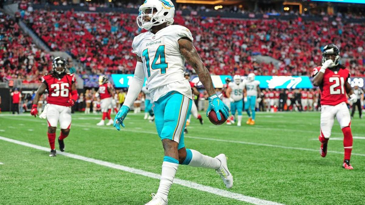 ATLANTA, GA - OCTOBER 15: Jarvis Landry #14 of the Miami Dolphins scores a second-half touchdown against the Atlanta Falcons at Mercedes-Benz Stadium on October 15, 2017 in Atlanta, Georgia. (Photo by Scott Cunningham/Getty Images)