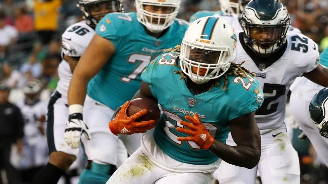 Miami Dolphins running back Jay Ajayi scores on a 2-yard first-quarter touchdown run against the Philadelphia Eagles on Thursday, Aug. 24, 2017, at Lincoln Financial Field in Philadelphia. (David Maialetti/Philadelphia Inquirer/TNS)