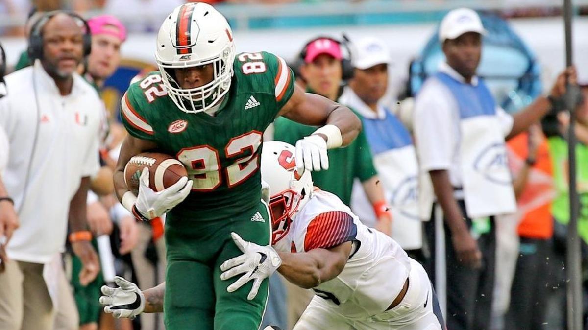 Miami Hurricanes Ahmmon Richards (82) catches a second quarter pass against Syracuse in October. Richards dealt with injuries much of the season and missed the ACC Championship game, which was one factor in Clemson drubbing UM, 38-3.