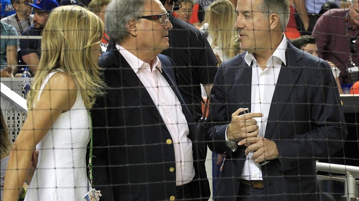 Miami Marlins owner Jeffrey Loria, center, and his wife July, chat with Cuban-American billionaire Jorge Mas, one of the bidders to buy the Miami Marlins during the MLB baseball All-Star game on Tuesday, July 11, 2017, at Marlins Park in Miami.