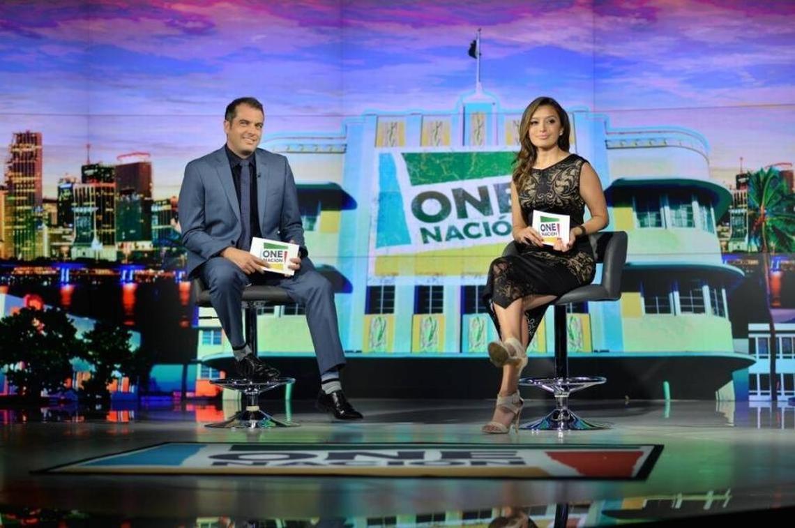 Max Bretos and Antonietta “Toni” Collins on the set of One Nacion in South Beach, will be among the ESPN reporters covering El Clasico Miami.