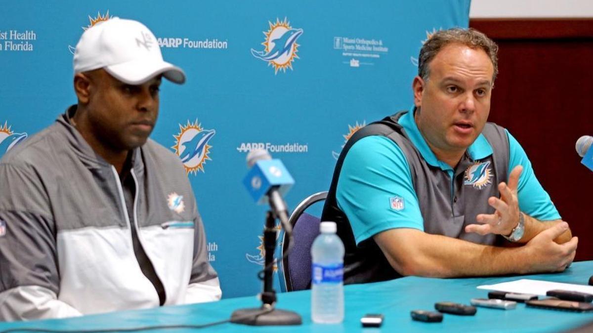 Miami Dolphins GM Chris Greer and VP Mike Tannenbaum talk to the media last April. They will have needs to fill when free agency begins next week.