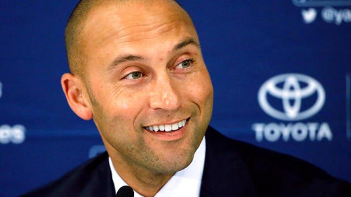 New York Yankees' Derek Jeter speaks to the media after the last baseball game of his career, against the Boston Red Sox, at Fenway Park in Boston in 2014.
