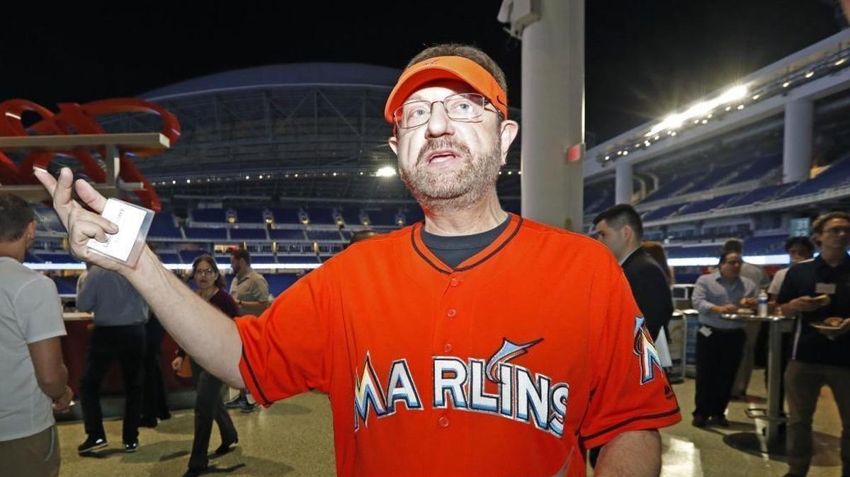Marlins Man Laurence Leavy, a season-ticket holder since 1993, speaks to reporters before a town hall meeting with Miami Marlins owner Derek Jeter at Marlins Park on Tuesday, Dec. 19, 2017.
