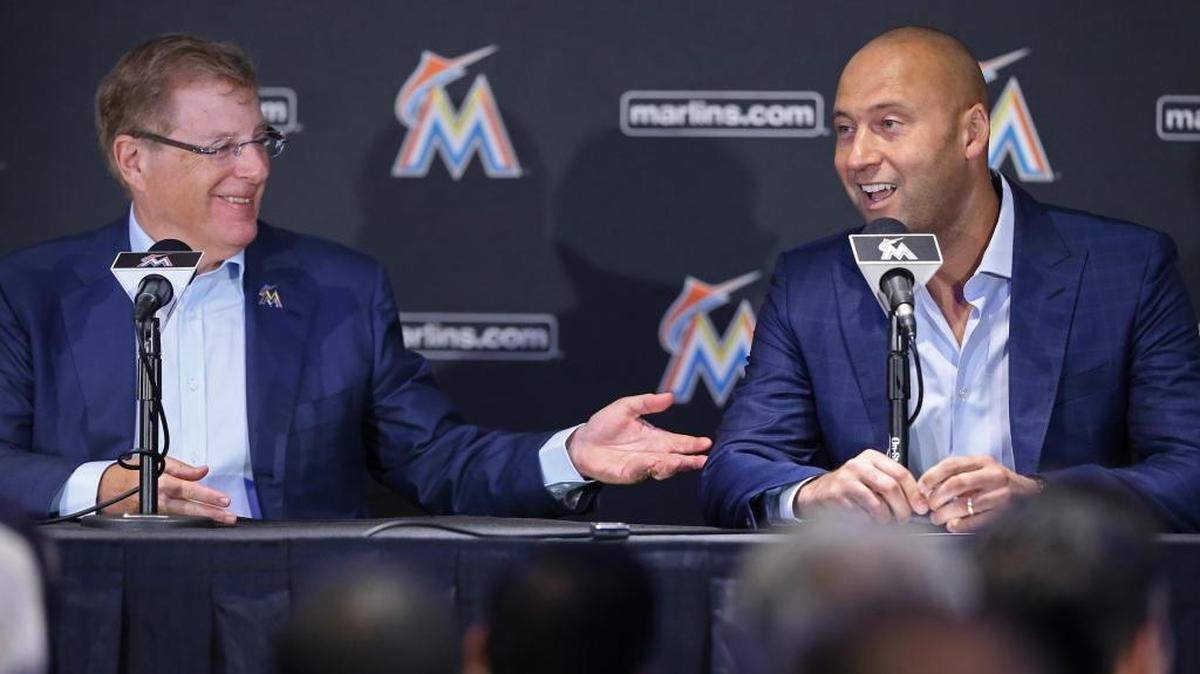 From left, Bruce Sherman and Derek Jeter hold their first press conference as Marlins owners on Oct. 3, 2017.