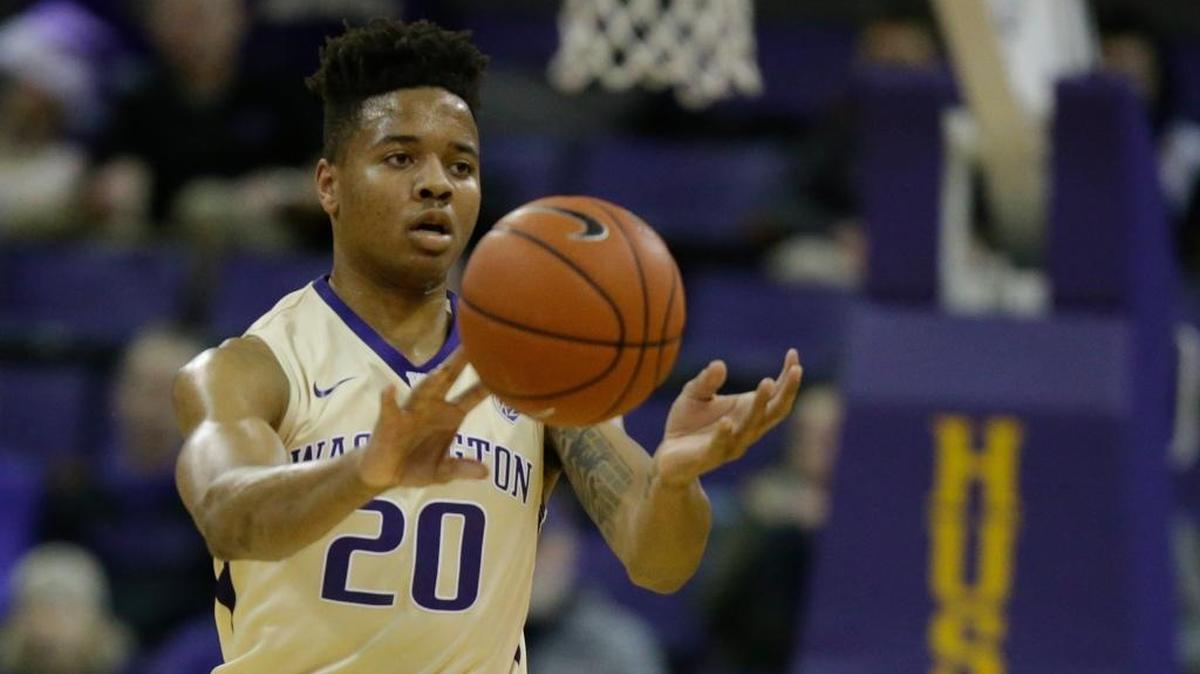 Washington guard Markelle Fultz passes the ball against Western Michigan in the first half of an NCAA college basketball game in Seattle on Dec. 18, 2016.
