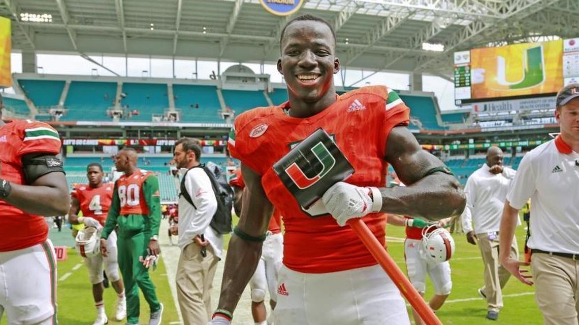UM sophomore-to-be safety Amari Carter (5) holds a sledge hammer after UM defeated Bethune-Cookman 41-13 in its season opener last September. UM coach Mark Richt thinks Carter is an elite player on the field and the nicest guy off it.