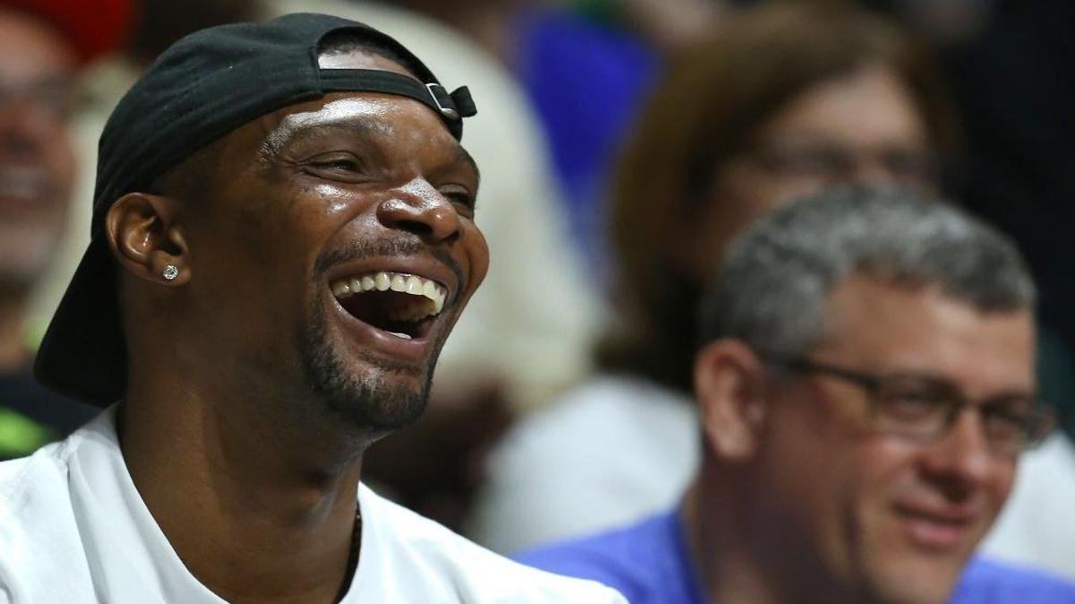 Miami Heat forward Chris Bosh smiles during the first half of an NCAA college basketball game between the Miami Hurricanes against the Duke Blue Devils at the Watsco Center in Coral Gables on Sat., Feb. 25, 2017.