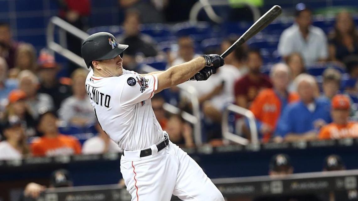 Marlins catcher J.T. Realmuto hits a double against the Mets in September. Realmuto would like to be traded.