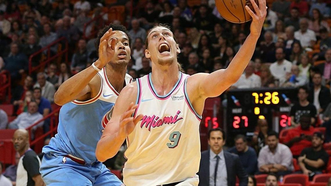 Heat forward Kelly Olynyk goes to the baske against Kings' forward Skal Labissiere on Jan. 25.
