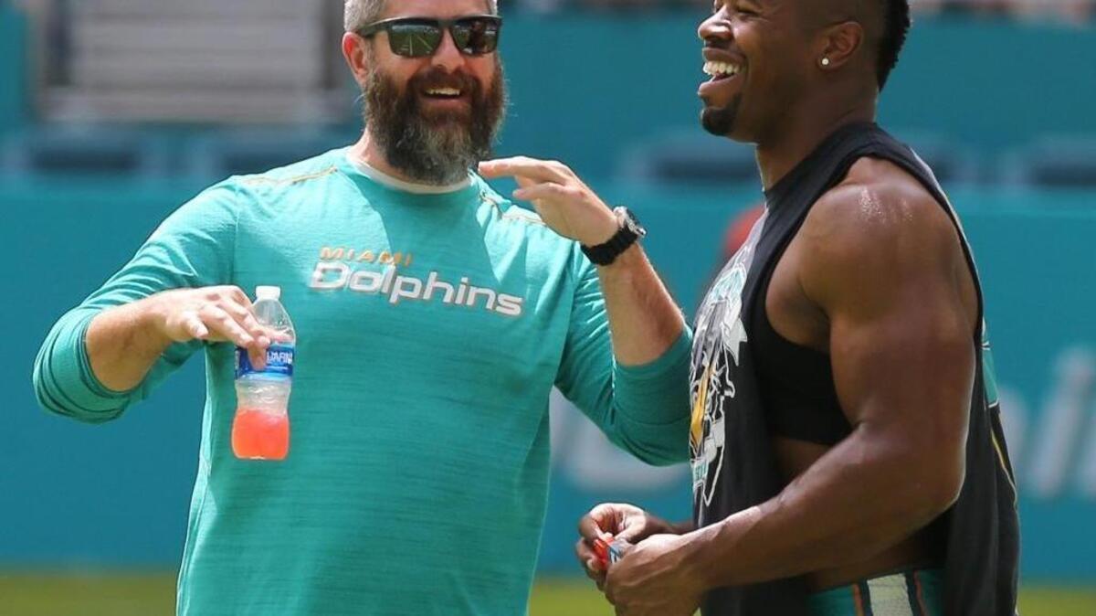 Miami Dolphins defensive coordinator Matt Burke and DE Cameron Wake before the Miami Dolphins scrimmage at Hard Rock Stadium in Miami Gardens, FL, August 5, 2017.