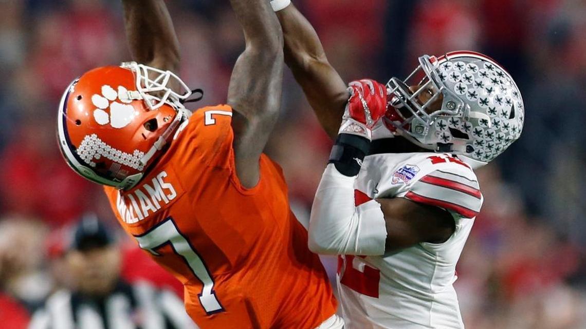 Clemson wide receiver Mike Williams (7) makes a catch against Ohio State cornerback Denzel Ward (12) in the 2016 Fiesta Bowl. Ward, a highly rated cornerback, will take a pre-draft visit to the Dolphins.