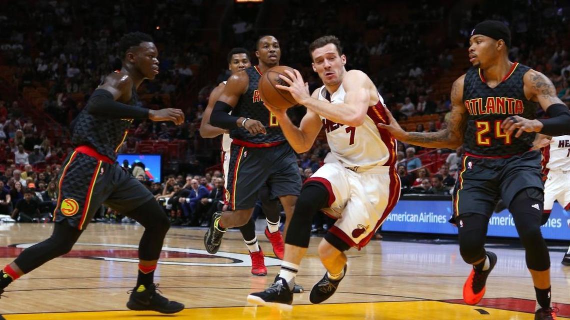 Miami Heat guard Goran Dragic drives against Atlanta Hawks forward Kent Bazemor (24) during the third quarter of an NBA basketball game at AmericanAirlines Arena in Miami on Wed., Feb. 1, 2017.
