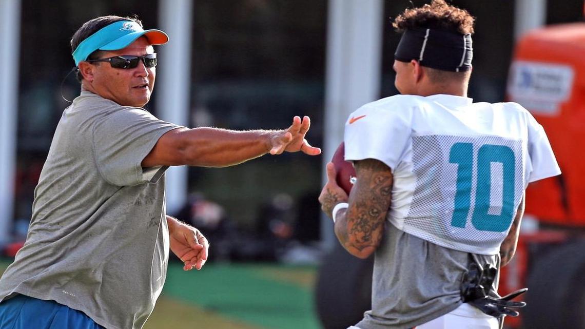Miami Dolphins offensive coordinator Clyde Christensen with WR Kenny Stills during training camp at the Miami Dolphins training facility in Davie, Fl, Aug. 3, 2017.
