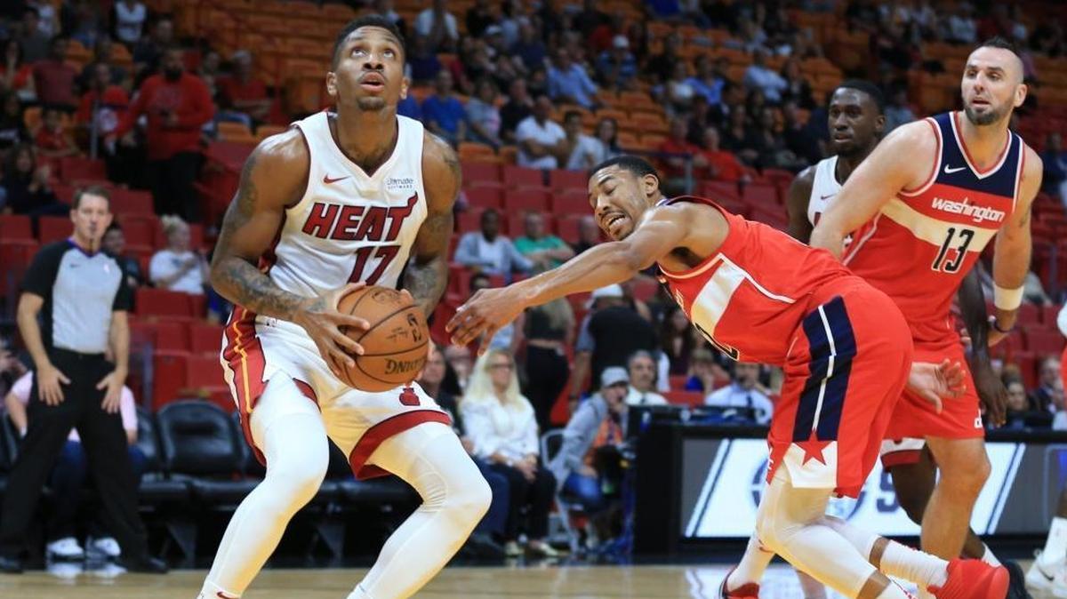 Miami Heat guard Rodney McGruder (17) looks to score in this Oct. 11 preseason game against Washington. McGruder was lost to a broken tibia soon after but will play again this season, according to the Heat.