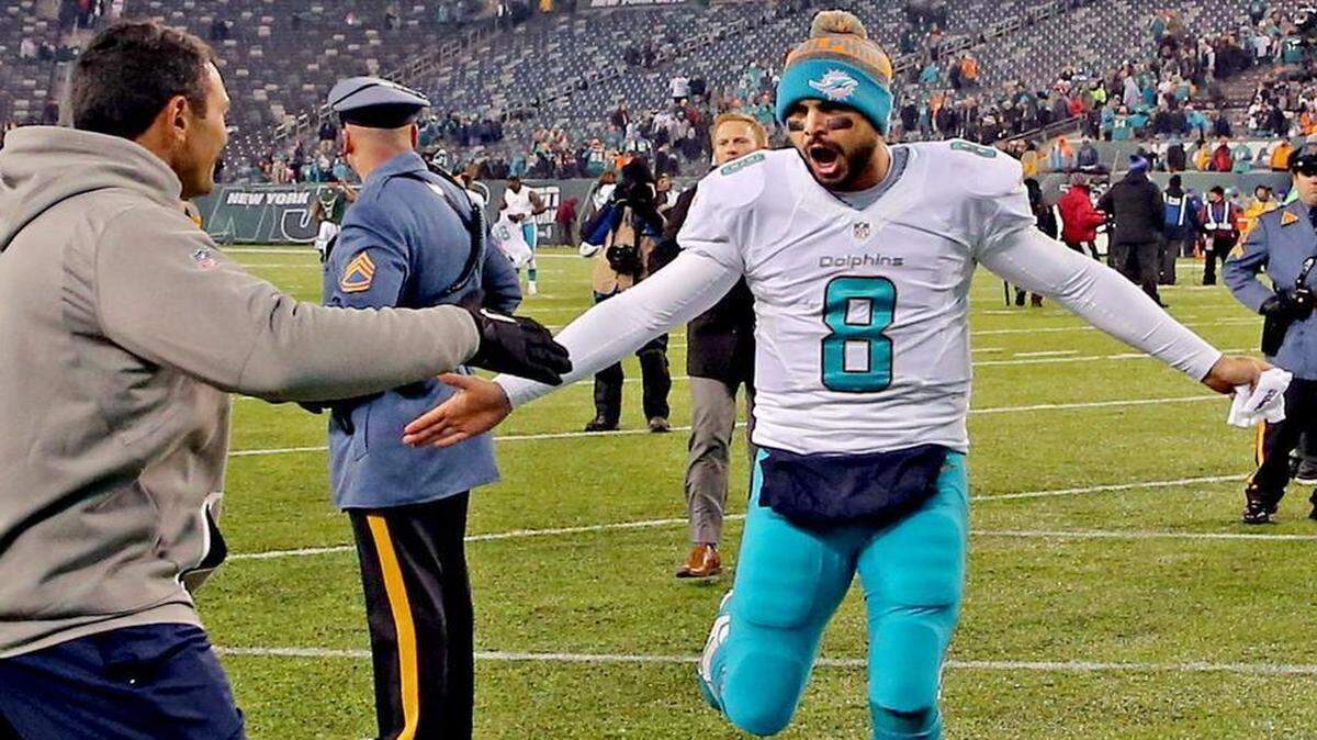 Miami Dolphins quarterback Matt Moore comes off the field Saturday, Dec. 17, 2016,after defeating the New York Jets at MetLife Stadium in East Rutherford.