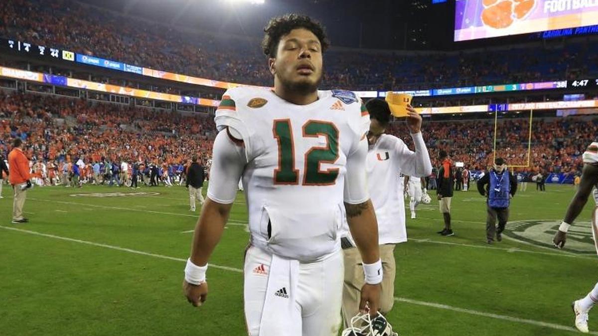 A defeated Miami Hurricanes quarterback Malik Rosier (12) walks of the field after the University of Miami Hurricanes are defeated by the Clemson Tigers in the ACC Championship Game at Bank of America Stadium in Charlotte, N.C. on Sat., Dec. 2, 2017.