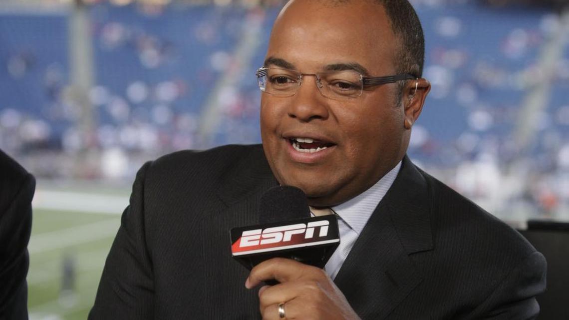 ESPN broadcaster Mike Tirico speaks before an NFL football game between the New England Patriots and the Buffalo Bills in Foxborough, Mass. on Sept. 14, 2009.