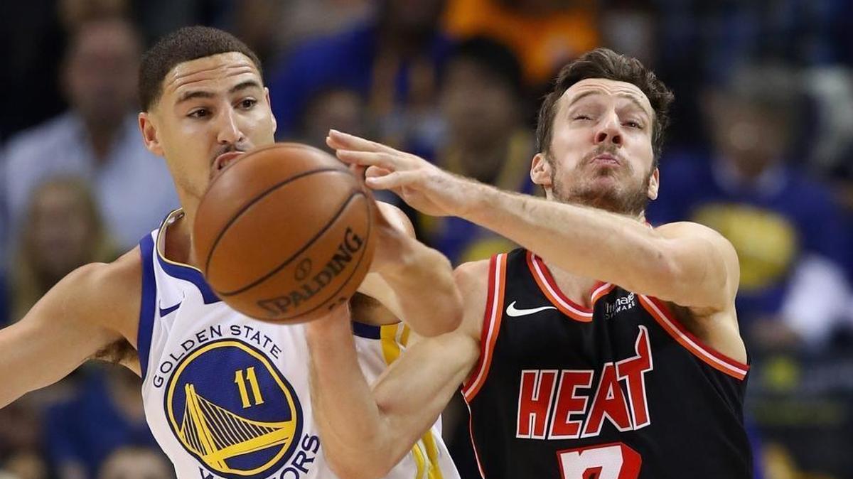 The Heat still owes Phoenix two first-round draft picks for Goran Dragic (right). In this AP photo, he and Golden State’s Klay Thompson compete for a loose ball in Monday’s game in Oakland.