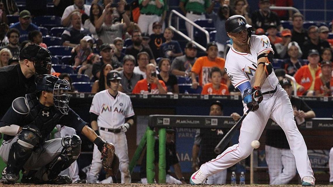Marlins right-fielder Giancarlo Stanton tries to connect with ball. The Miami Marlins played its last game of the season against the Atlanta Braves as Giancarlo Stanton attempted to tie Babe Ruth's season home run record on Sunday, October 1, 2017.