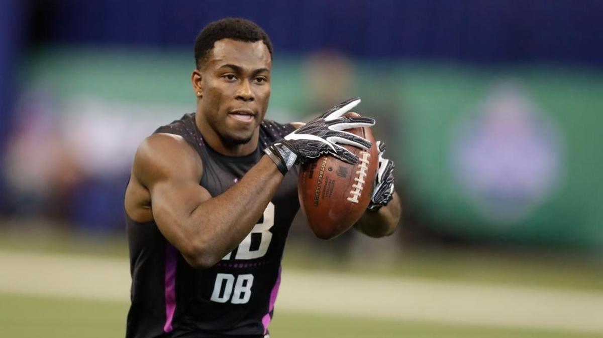 Iowa defensive back Josh Jackson runs a drill during the NFL football scouting combine, Monday, March 5, 2018, in Indianapolis. He will visit the Dolphins in the coming days. (AP Photo/Darron Cummings)