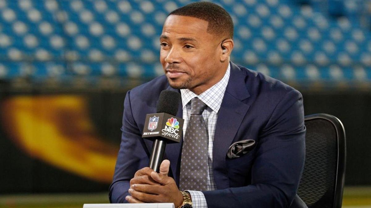 Announcer Rodney Harrison talks on the set before an NFL football game between the Carolina Panthers and the New Orleans Saints in Charlotte, N.C., Thurs., Nov. 17, 2016.