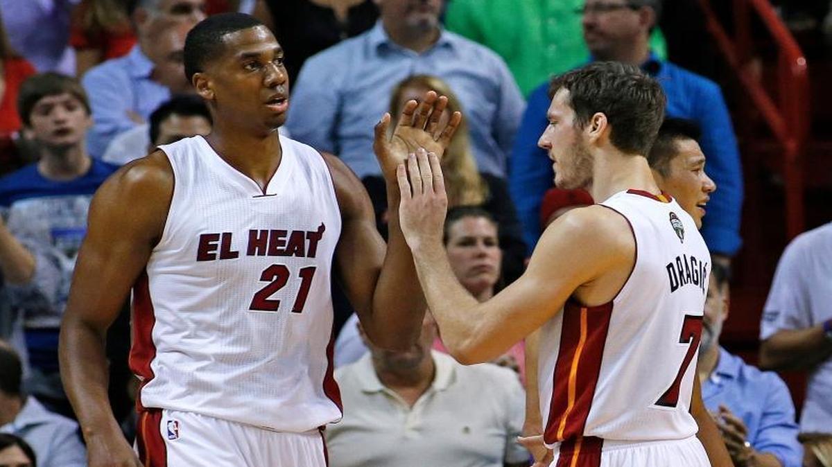Miami Heat's Hassan Whiteside (21) is congratulated by Miami Heat's Goran Dragic (7) after scoring against the Los Angeles Lakers during the second half of an NBA basketball game in Miami, Wednesday, March 4, 2015.