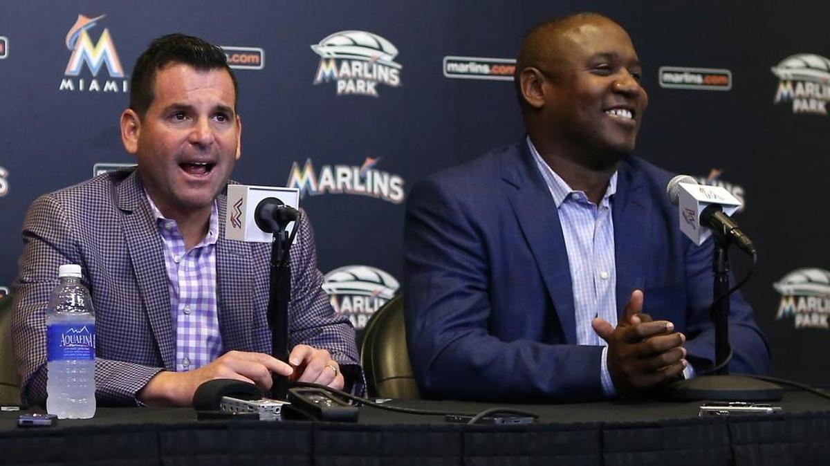 Marlins executive Michael Hill, right, is joining former Marlins president David Samson, left, and former outfielder and special assistant Jeff Conine in a 183 mile run across seven continents.