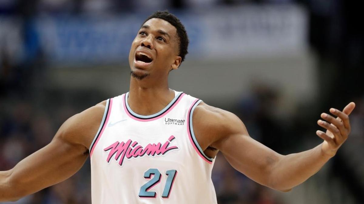 Miami Heat center Hassan Whiteside (21) throws his arms up after his team was charged with a foul in the second half of Monday’s game against Dallas. Whiteside had 25 points and 14 rebounds. (AP Photo/Tony Gutierrez)