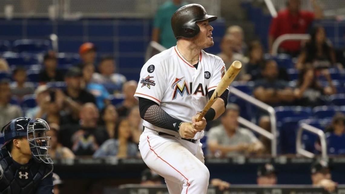 Marlins first baseman Justin Bour (41) — batting here against Atlanta last September — will be one of the few remaining power threats in Miami’s lineup.