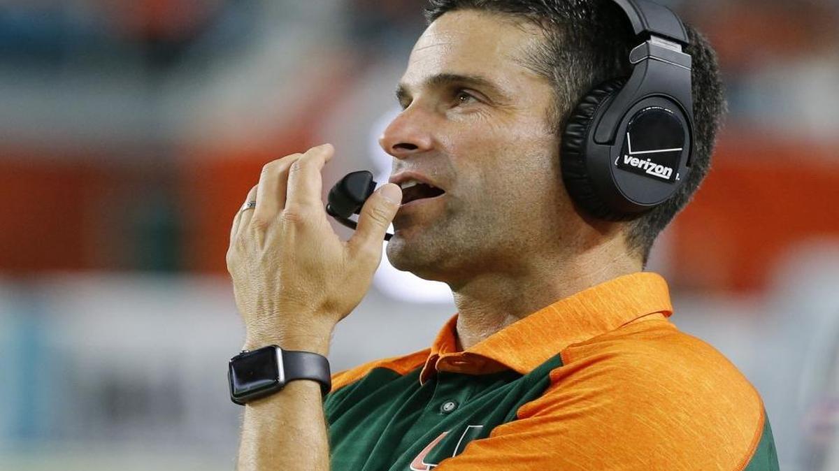 Miami Hurricanes coach Manny Diaz coaches from the sidelines as the University of Miami hosts Florida A&M at Hard Rock Stadium on Sat., Sept. 3, 2016.