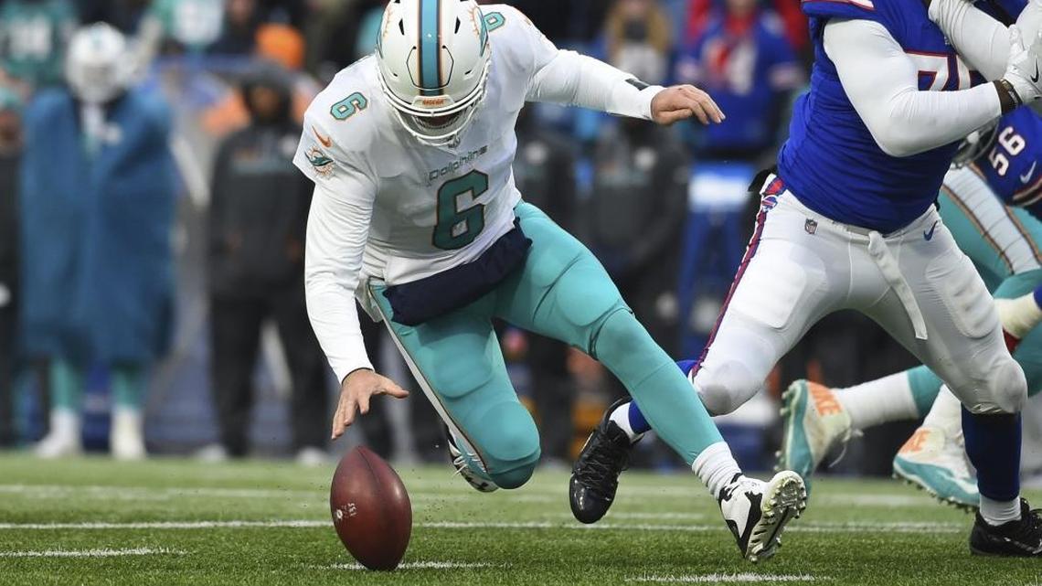 Miami Dolphins quarterback Jay Cutler (6) recovers a fumble during the second half against Buffalo on Dec. 17, 2017.