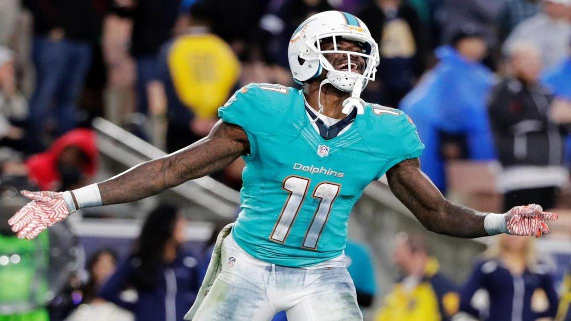 Miami Dolphins wide receiver DeVante Parker celebrates after scoring the winning touchdown during the second half of an NFL football game against the Los Angeles Rams Sun., Nov. 20, 2016, in Los Angeles. The Dolphins won 14-10.