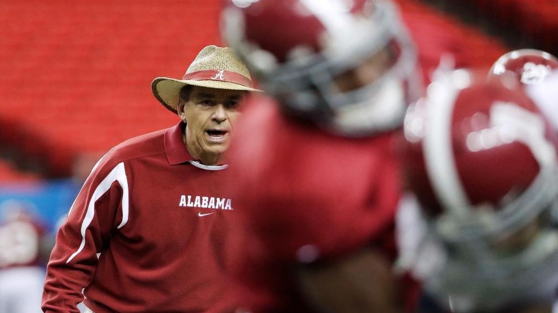 Alabama head coach Nick Saban watches a drill during a Peach Bowl NCAA college football practice in Atlanta, Wed., Dec. 28, 2016. Alabama and Washington will face off in the Peach Bowl football game Saturday.