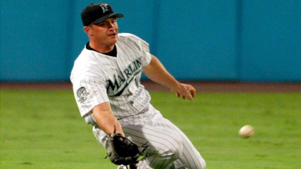Todd Hollandsworth, shown here on the Florida Marlins in 2003, will be the new color analyst for the Miami Marlins, according to a source.