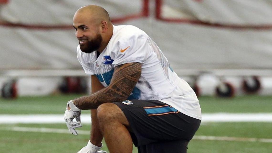Miami Dolphins linebacker Koa Misi is shown in this AUg. 25, 20105, file photo at practice at the Miami Dolphins training facility. Misi plans to visit with doctors again before the start of training camp in late July.