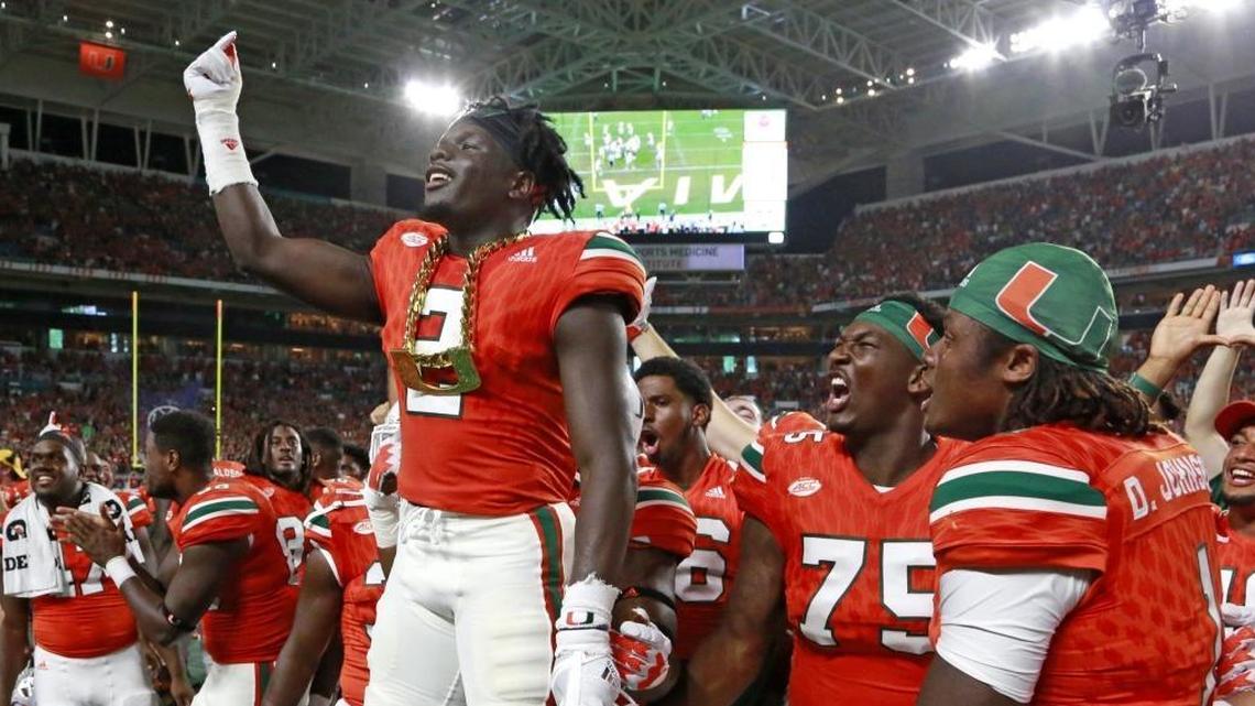 Miami Hurricanes starting cornerback Trajan Bandy (2) wears the Turnover Chain after intercepting a pass against Notre Dame last November. No. 8 UM opens its season on Sunday night against No. 25 LSU in Arlington, Texas.