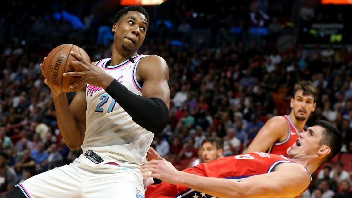 Heat center Hassan Whiteside goes to the basket against Philadelphia's forward Ersan Ilyasova, in the second quarter of the Miami Heat vs Philadelphia 76ERS, game at AmericanAirlines Arena in Miami on Thursday, March 08, 2018.