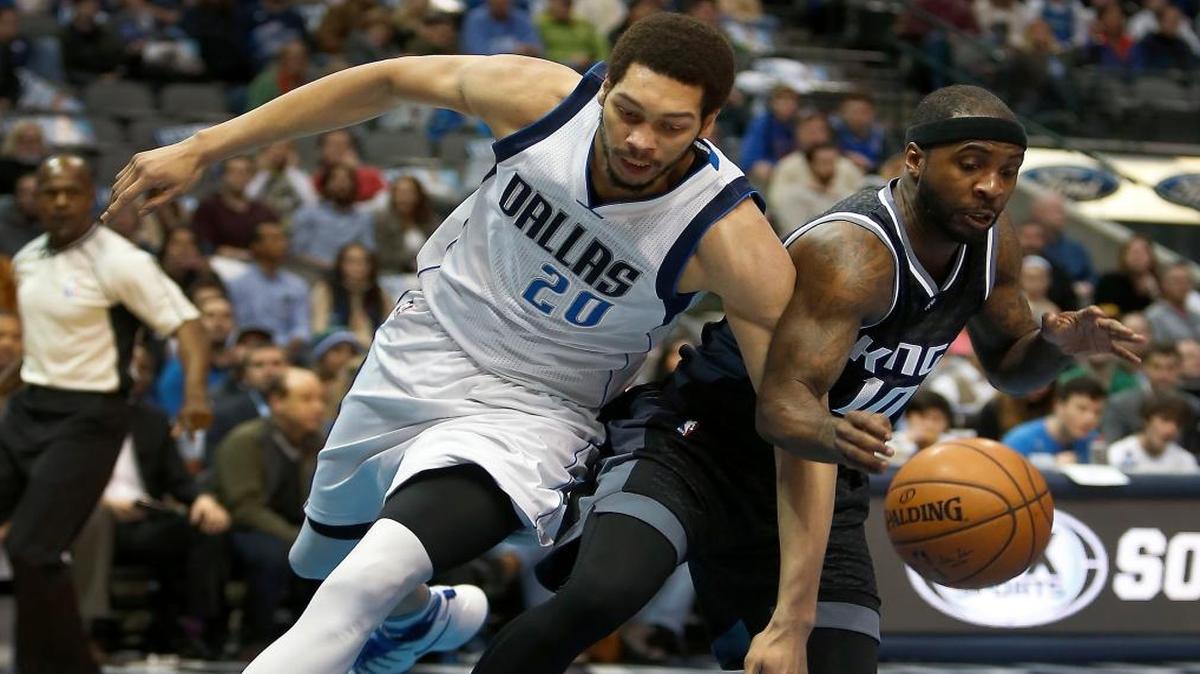 Sacramento Kings guard Ty Lawson, right, makes a steal against Dallas Mavericks center A.J. Hammons (20) in the first half of an NBA basketball game on Saturday, Dec. 18, 2016 in Dallas . (AP Photo/Brad Loper)