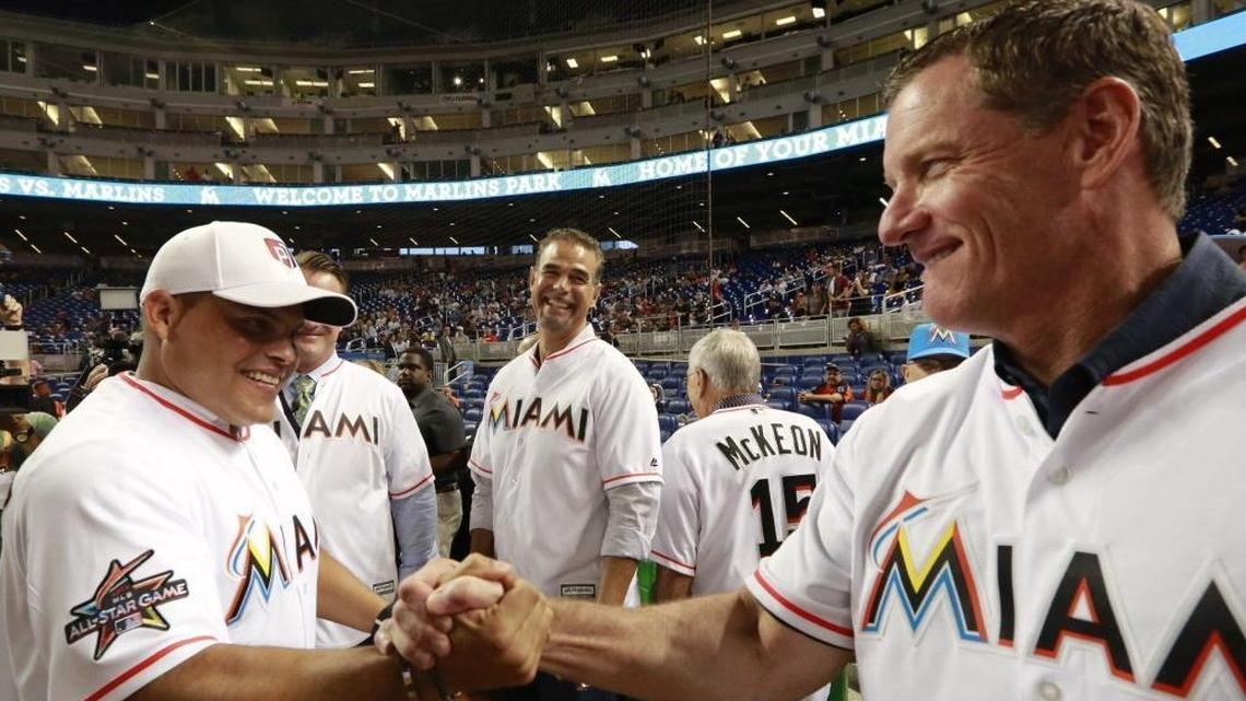 Former Marlins players Ivan Rodriguez, Mike Lowell and Jeff Conine, left to right, before the Marlins game against the San Diego Padres at Marlins Park on Sat., Aug. 26, 2017.