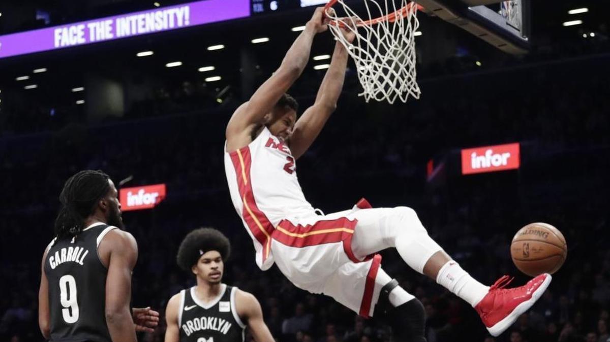 Miami Heat center Hassan Whiteside (21) dunks in front of Brooklyn Nets players Jarrett Allen (31) and DeMarre Carroll (9) during a January game. Whiteside was puzzled about the Heat not getting a player selected in the All Star Game. (Photo/Frank Franklin II)