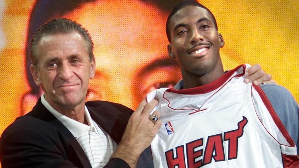 The 2000 news conference when Eddie Jones, right, was acquired by Heat president Pat Riley, left, in a trade from Charlotte. Jones sees similarities between himself and Heat swingman Josh Richardson.