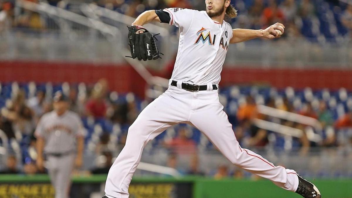 Marlins' pitcher #61 Adam Conley throws a pitch in the first inning as the Miami Marlins host the San Francisco Giants on Monday, August 14, 2017.