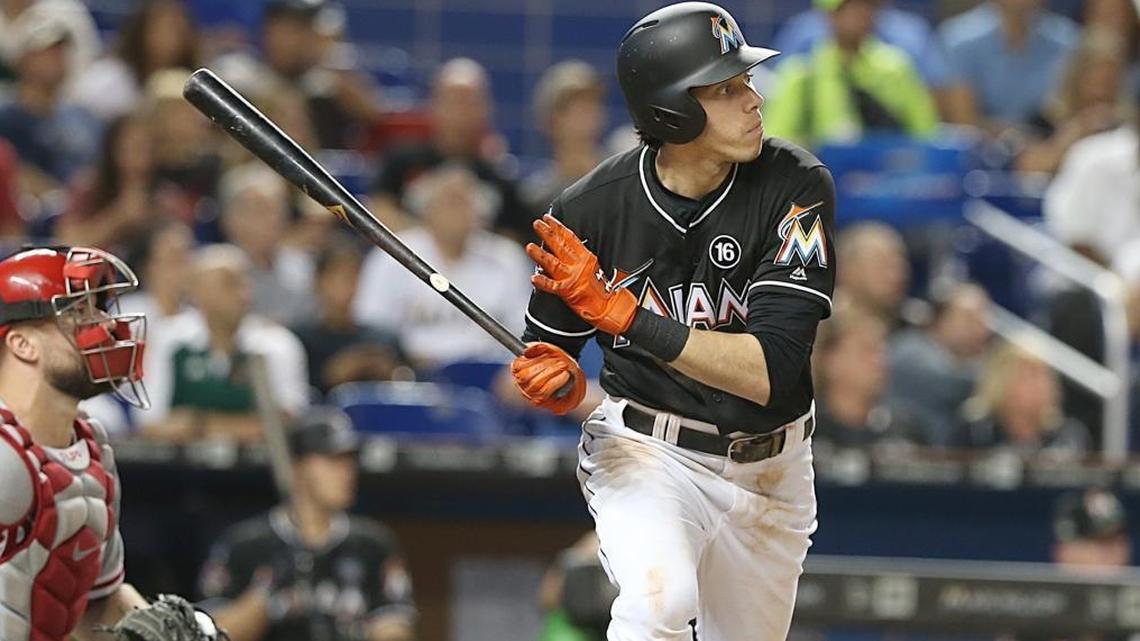Miami Marlins' left fielder Christian Yelich hits a triple in this September game against Philadelphia. Yelich has asked for a trade and the Marlins are talking to teams.