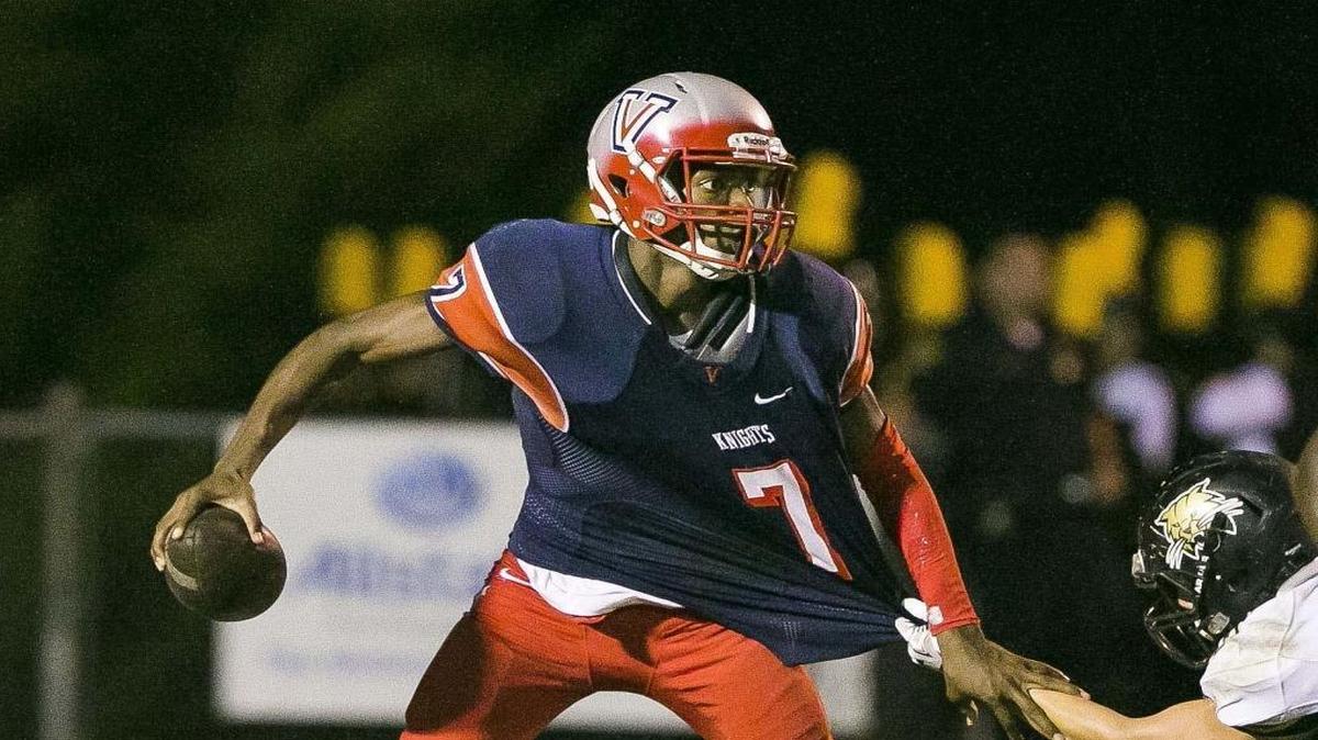 Vanguard's N'kosi Perry tries to elude a Buchholz player in the first half. Vanguard lead 12-0 at the half as Vanguard High School hosted Buchholz High School Friday night, Sept., 23, 2016 at Booster Stadium in Ocala, FL.
