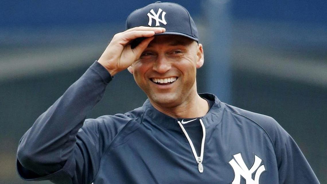 In this April 7, 2014, file photo, New York Yankees shortstop Derek Jeter (2) adjusts his cap before the home opener baseball game against the Baltimore Orioles at Yankee Stadium in New York.